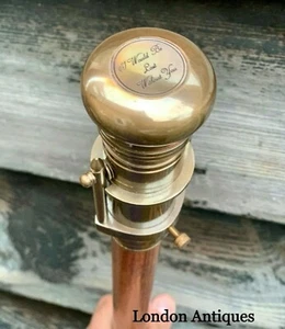 Antiguo bastón de madera con mango telescópico de latón - Imagen 1 de 4