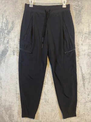 Pantalones de chándal Athleta para mujer talla 4 negros con cordón bolsillos en la cintura atletismo Foto 1 de 4