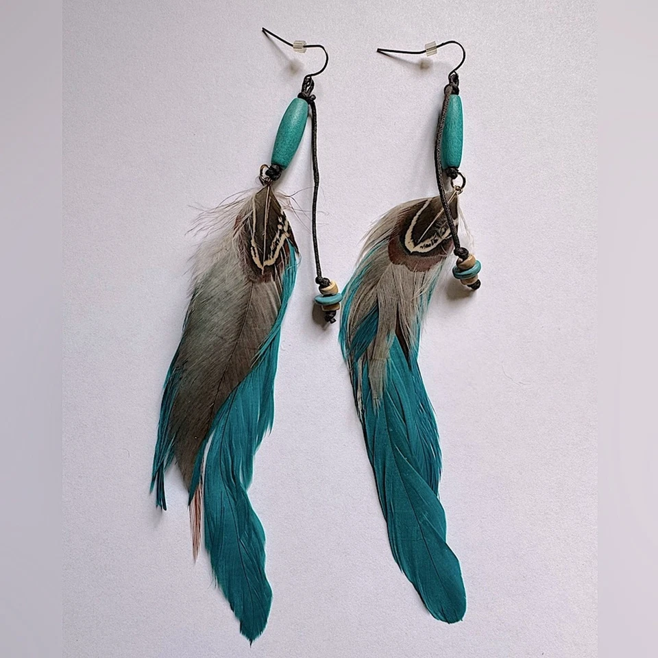 Pendientes de plumas turquesa nuevos sin etiquetas Foto 1 de 1