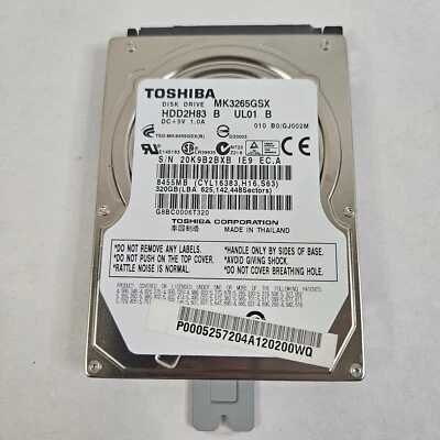 Toshiba HDD2H83  MK 3265G SX 320 GB, Intern ,5400RPM Bundled W/ 2GB and 1GB RAM - Image 1 of 4