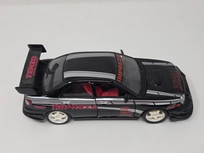 Subaru Impreza 1:24 Scale Die-Cast Model Car Black With Tenzo Racing Decals - Image 1 of 4