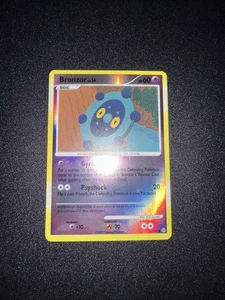 Pokémon TCG Bronzor 55/100 Stormfront Reverse Holo quasi nuovo/lp - Foto 1 di 2