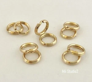 12pcs 7mm 14k oro amarillo relleno redondo SPLIT JUMP RING conector de encanto GF R17g - Imagen 1 de 3