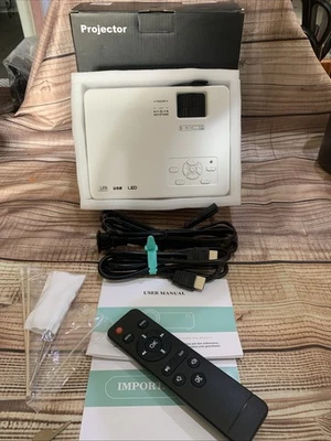 Purshe Mini Bluetooth Projector With Remote Included New In Box - Image 1 of 4