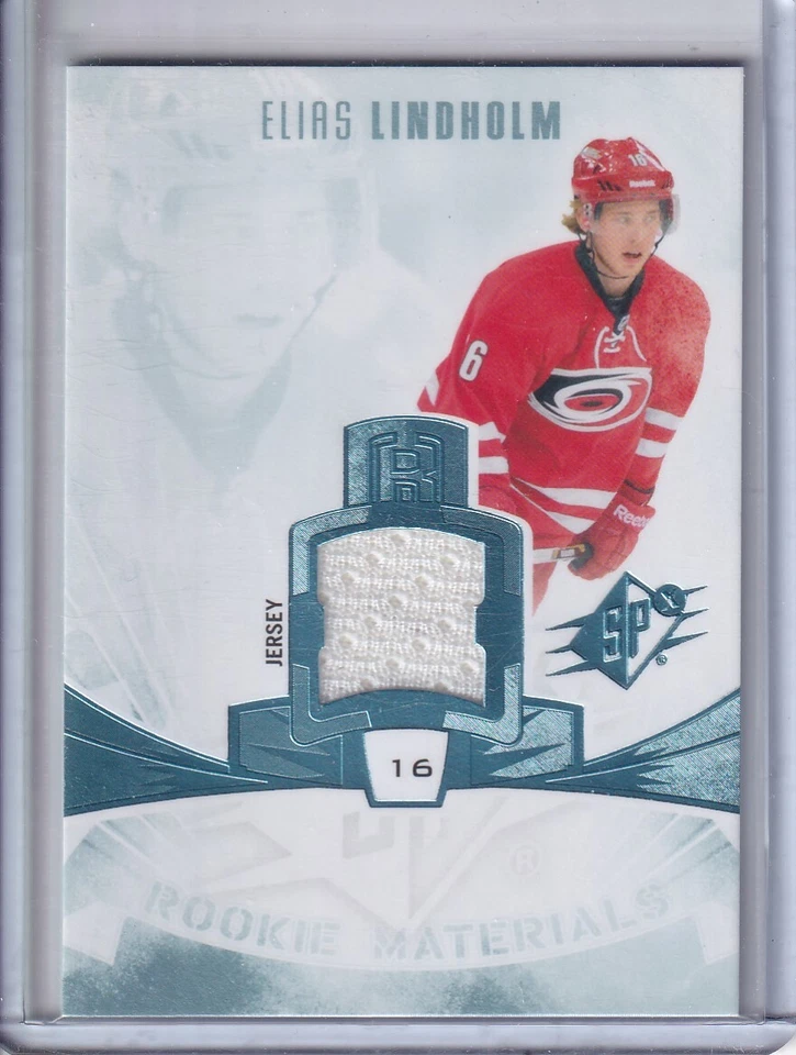 2013-14 SPx Rookie Materials #EL Elias Lindholm RC JERSEY - Carolina Hurricanes - Image 1 of 1