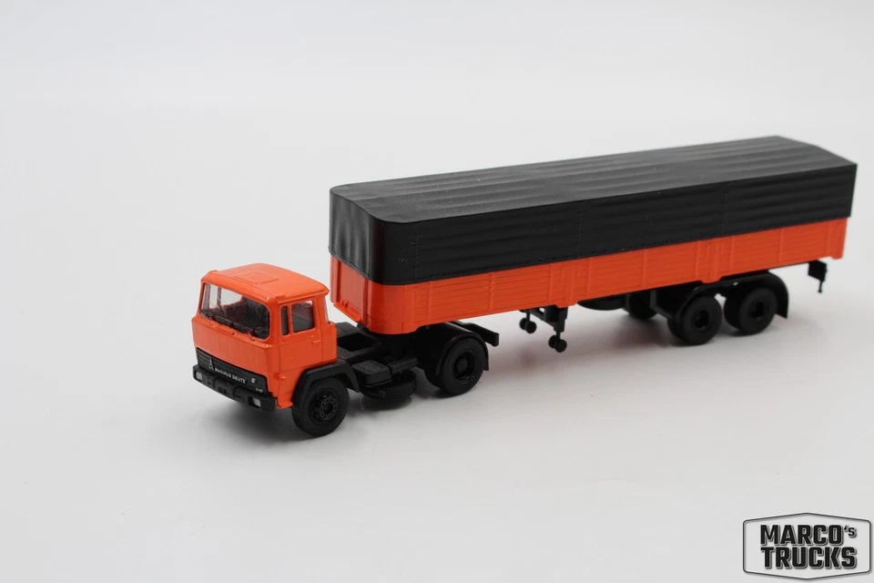 Herpa Brekina Magirus D310 Semitrailer 2a/2a orange/black Self-made 1:87 /H21807 - Image 1 of 1