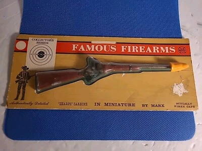 VINTAGE FAMOUS FIREARMS IN MINIATURE BY MARX "SHARPS" CARBINE CAP GUN. 1962 NOS - Image 1 of 4