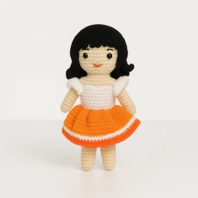 Sutra Soft Amigurumi Crochet Girl Doll – Black Hair with Orange Skirt Toy Gift - Image 1 of 4