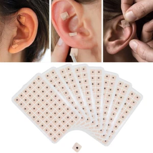 Juego de 600 pegatinas auriculares parche aguja terapia masaje acupuntura oído - Imagen 1 de 11