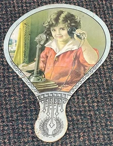 c1930 Cameron Missouri P E Kenney ventilador publicitario - niña en teléfono candelabro - Imagen 1 de 2