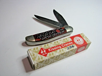 Cuchillo de hueso rojo vintage Robert Klaas Kissing Cranes KC 61 Bronco Buster con caja Foto 1 de 4