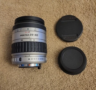 SMC Pentax FA 28-80mm F/3.5-5.6 AF Silver Lens W/ Caps - Image 1 of 4