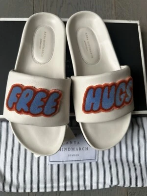 Sandalias planas deslizantes de cuero Anya Hindmarch Reino Unido 2 UE 35 EE. UU. 3 abrazos gratis Foto 1 de 4