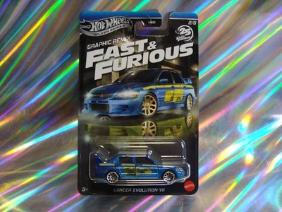 Lancer Evolution 7 🔥🏆🔥 HW Graphic Remix 25 anni Fast & Furious confezione originale/nuovo 1:64 - Immagine 1 di 2