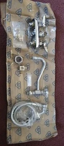 T&S B-1156 Wall Mounted Workboard Faucet with Spray Valve and 4" Centers - 7 7/8 - Picture 1 of 8