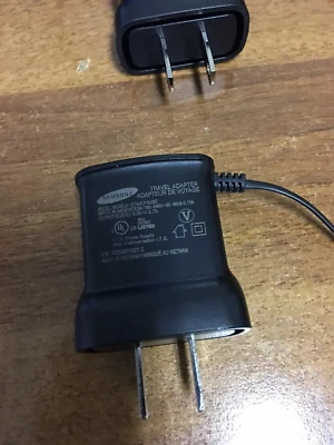 ETAOU10JBE Home Travel Adapter Micro USB Charger 5.0V .7A for Samsung phones - Image 1 of 4