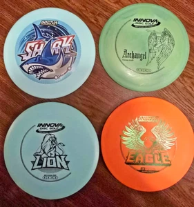used Innova disc golf discs lot with shark , lion, eagle, and archangel. - Picture 1 of 10