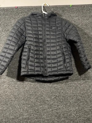 Chaqueta acolchada negra con capucha Reebok unisex para niños talla 7 Foto 1 de 4