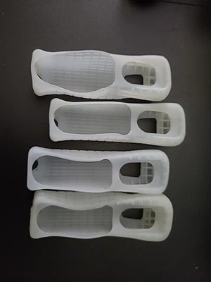 LOTE PAQUETE DE 4 FUNDAS PARA MANDO NINTENDO WII SILICONA BLANCO TRANSPARENTE Foto 1 de 2