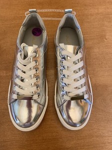 silver athletic shoes