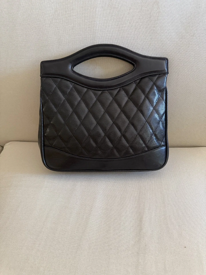 Bolso de mano de cuero Carlisle acolchado y convertible en bolso cruzado Foto 1 de 4