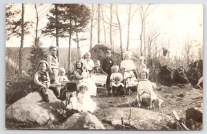 RPPC Darling Little Girls with Antique Dolls and Boys Playing Postcard Puppy Dog - Picture 1 of 4