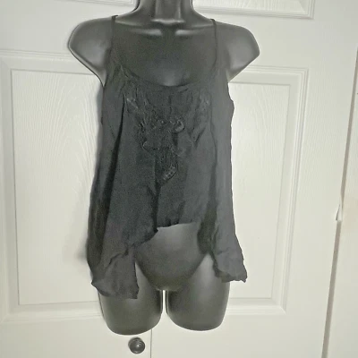 Camisa sin mangas Guess para mujer mediana negra transparente recortada detalle de encaje caprichoso Foto 1 de 4