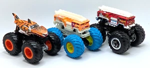 3 Hot Wheels 1/64 Monster Trucks Tiger Shark & 2 Five Alarm 1 Glows in the Dark - Picture 1 of 7