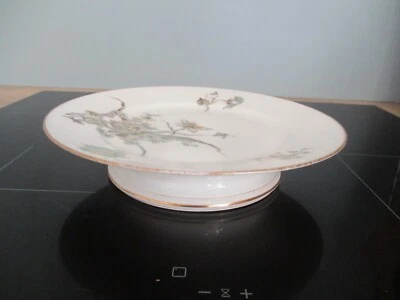 Plat à gâteaux  en porcelaine de Vierzon Hache Jullien & Co décor floral - Photo 1/4