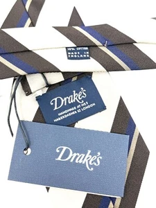 Nuevo con etiquetas Corbata de Seda Drakes Hecha en Inglaterra Masilla Marrón Azul Bloque Repp Rayas Sin Punta #11 - Imagen 1 de 5