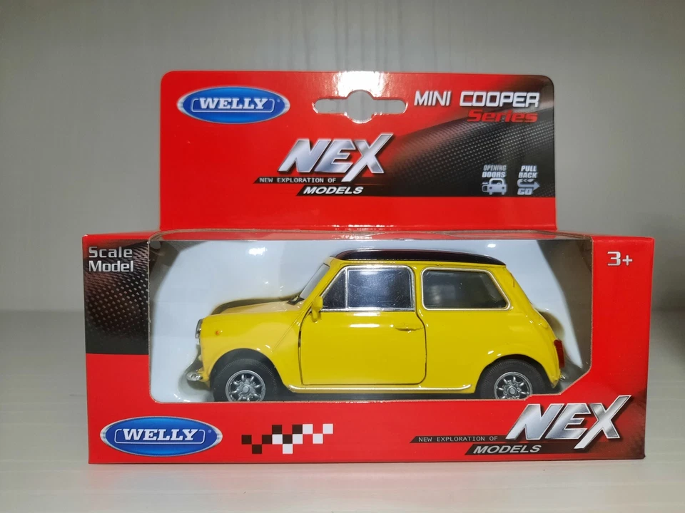 Modellino Statico Mini Cooper 1300 Welly Auto Colore Nero/Giallo Scala 1:39 - Immagine 1 di 1