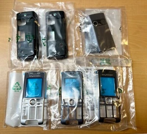 ORYGINALNY ZESTAW OBUDOWY CZĘŚCI ZAMIENNYCH SONY ERICSSON K320i OSŁONA PRZEDNIEJ BATERII A/B - Zdjęcie 1 z 1