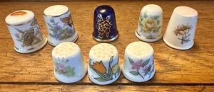 VTG Lot 8 Thimbles Ceramic Porcelain Flowers Butterfly White Cobalt Blue Japan - Picture 1 of 8