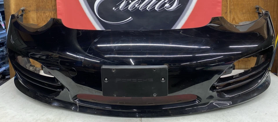 Cubierta del parachoques delantero Porsche Boxster 987.2 2009 (schwars/negro azabache) 98750531120 Foto 1 de 4