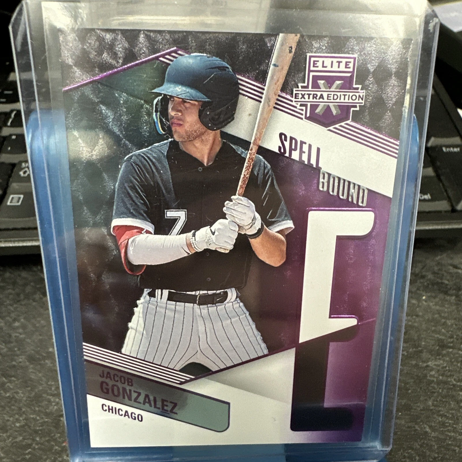 2023 Elite Extra Edition SPELLBOUND PURPLE "E" #d 33/49 Jacob Gonzalez White Sox