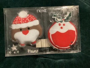 Brandneu in Verpackung Neu Next 2er Set wiederverwendbare Weihnachts-Handwärmer - Rotkehlchen & Pudding - Bild 1 von 4