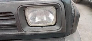 scheinwerfer links für DAIHATSU FEROZA SPORTRAK FASE 1 3P 1992 132551 - Bild 1 von 9
