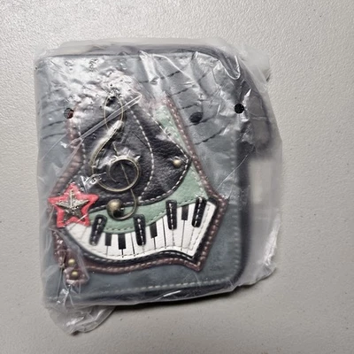 PIANO KEYS MUSIC ZIP AROUND WALLET CHALA BLUE - Image 1 of 2