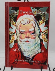 The Twelve Laws of Santa Claus by Christopher Hogan Lay Hardcover T2 - Imagen 1 de 5