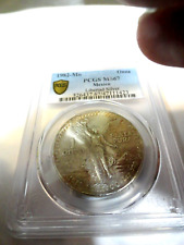1982 MEXICAN  LIBERTAD GRADED MS 67 BY PCGS 1 OZ.999 SILVER GOLD SHIELD