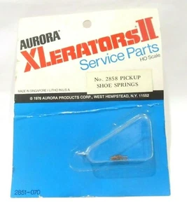 VINTAGE AURORA XLERATORS II SLOTLESS SLOT CAR HO ( 4 PICK UP SHOE SPRINGS )NEW - Picture 1 of 3