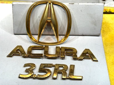 Tapa maletero trasero original Acura 96-04 3,5 RL sedán chapado en oro solo 3 emblemas Foto 1 de 4
