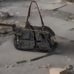 MZ Wallace Traveler Bag Duffel Black/Maroon with Gold Hardware Multiple Pockets - Picture 1 of 13