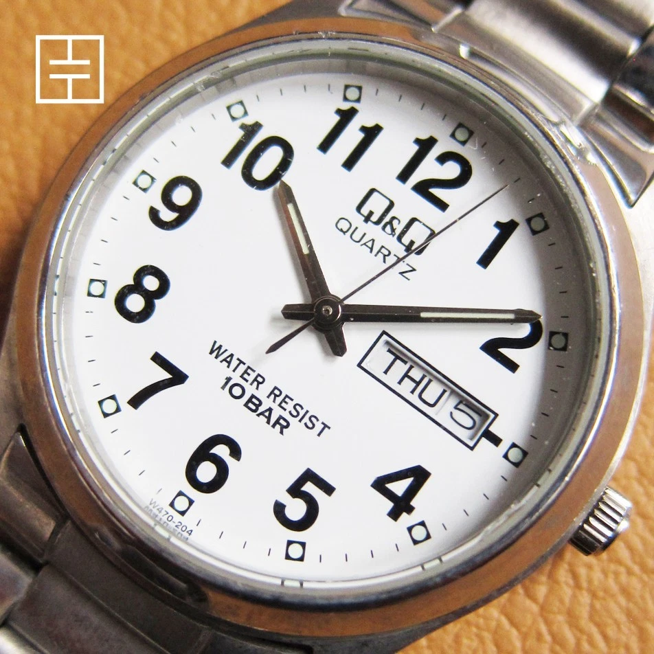 Q&Q (Citizen) 2105 S.S Reloj de Cuarzo con Esfera Blanca Foto 1 de 4