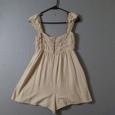 L.A. Mameluco pequeño beige avena boho con volantes y correa Hearts para mujer Foto 1 de 4