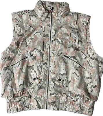 Free People FP MOVEMENT Off The Grid 印花背心象牙色花卉 $118 全新带标签 L 码 — 第 1/4 张图片