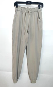 Pantalones de chándal Lululemon elásticos de tiro alto para mujer 4 marfil natural Nulu - Imagen 1 de 11