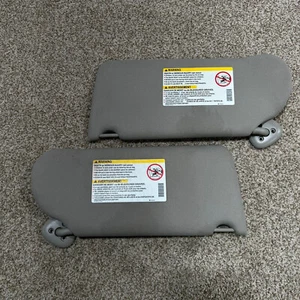 1997-2003 Pontiac Grand Prix Driver & Passenger Side Sun Visor Pair Gray Cloth - Picture 1 of 8