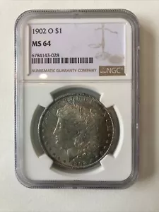 United States 1902 Silver Morgan Dollar Coin Toned NGC MS 64 - Picture 1 of 4