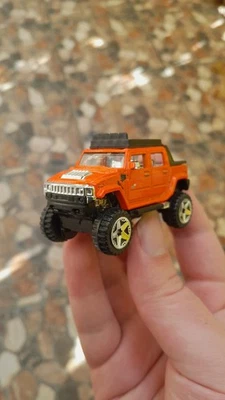 Hot Wheels Hummer H2 TM GM car model 1:64 - Image 1 of 4